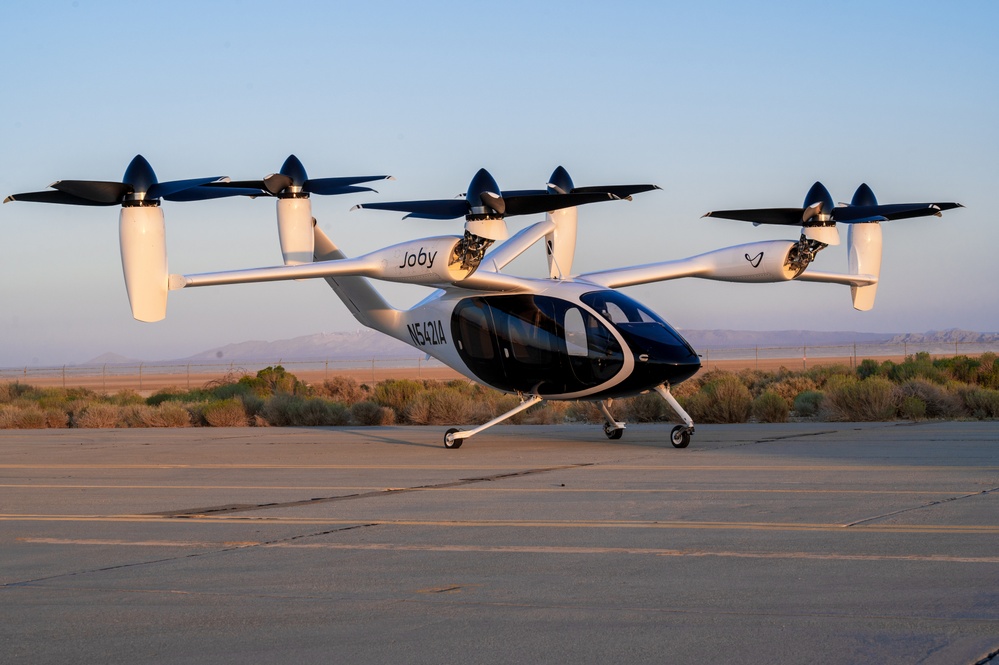 Joby S4 electric aircraft with six propellers on a taxiway at Edwards Air Force Base.